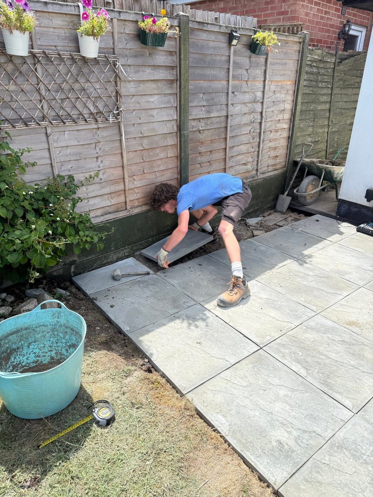 Slabs going down, one at a time, perfectly level and aligned
